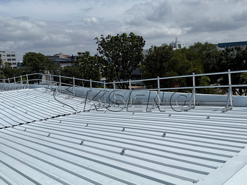 Durable metal roof solar mounting system paired with a rooftop guardrail for enhanced safety and efficiency. The mounting system ensures reliable solar panel installation on metal roofs, while the robust guardrails provide essential fall protection during installation and maintenance. Both products are crafted from high-strength, corrosion-resistant materials for long-term durability and easy, cost-effective installation.